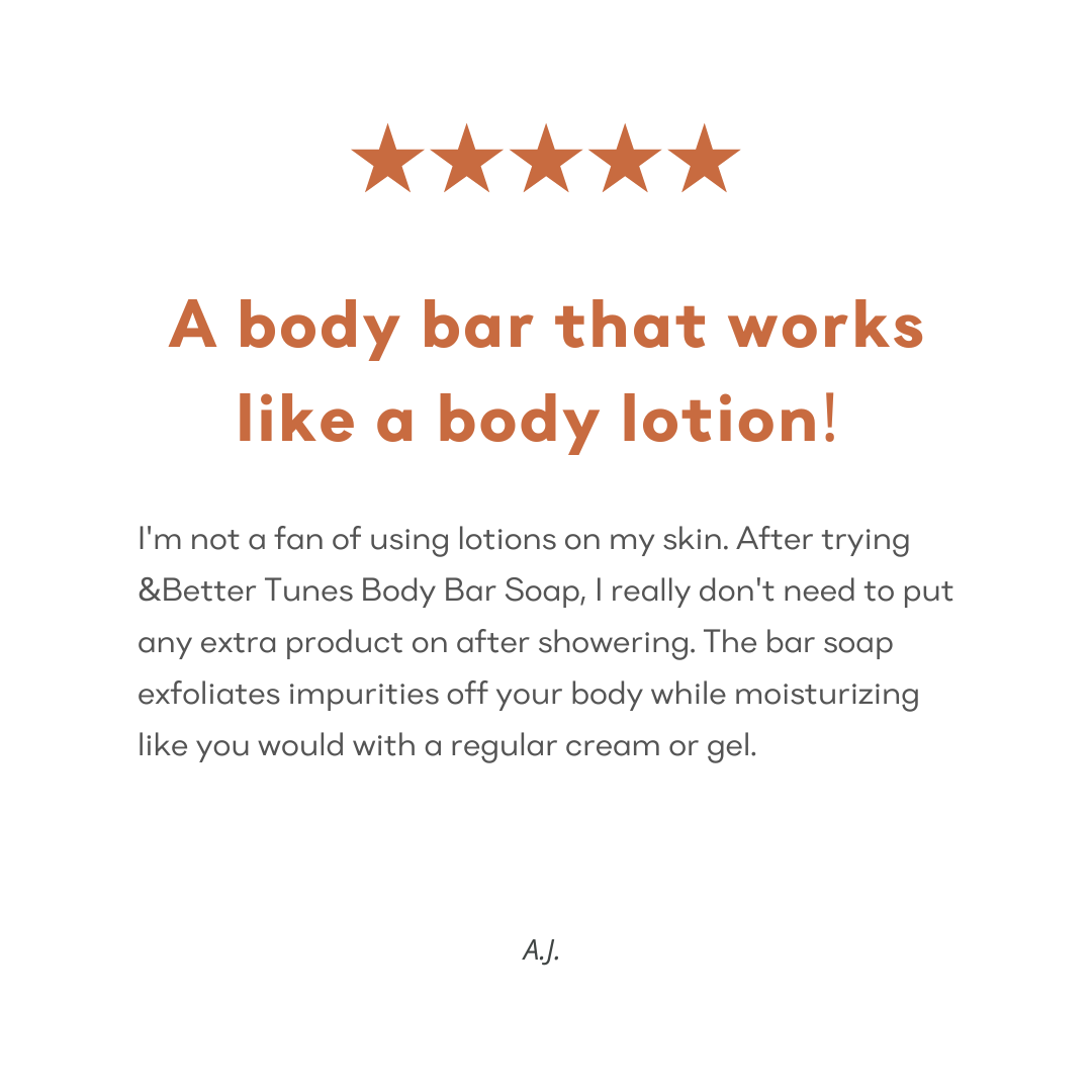 Screenshot of a 5-star Amazon customer review for &Better's Tunes Body Scrub Bar, with the customer stating 'A body bar that works like a lotion bar', emphasizing the product's moisturizing capabilities and indicating high customer satisfaction and effectiveness of the product