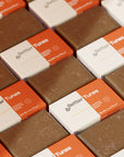 &Better Tunes Exfoliating + Moisturizing Body Bar. Our natural body bar is made with high-quality ingredients, premium essential oils, and powered with kelp powder and pumice. Natural formula cleans and hydrates your skin and offers a spa-grade sensorial experience. The cold processed body bar preserves the benefits of hand-harvested, organic, and sustainably grown shea butter and other natural oils. Plastic-Free. Organic Shea Butter