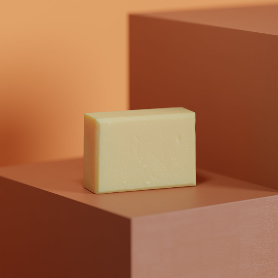 &Better Shampoo Bar, a handcrafted, natural soap displayed on an earth-toned background, showcasing its eco-friendly and sustainable qualities