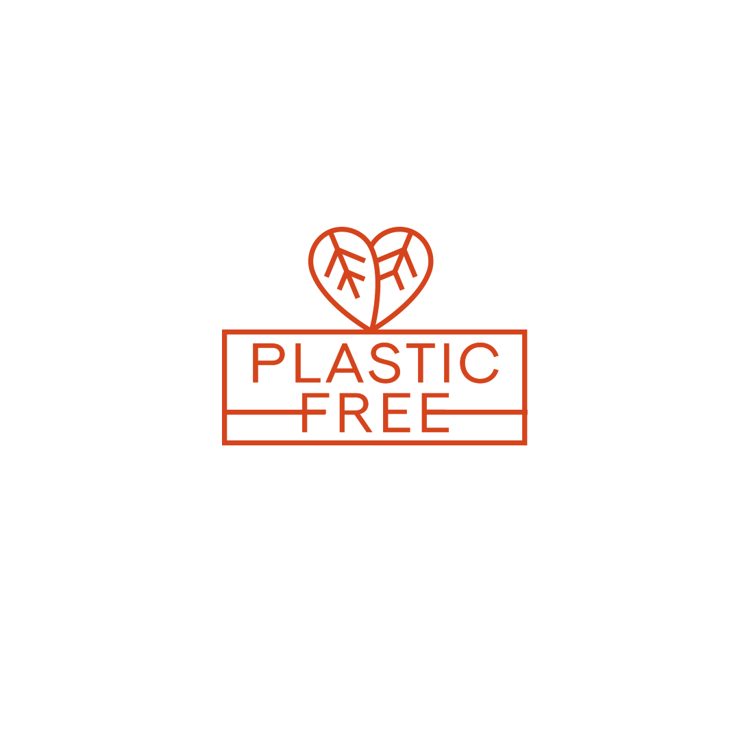 Plastic-free" written in large letters diagonally on a white background, symbolizing the concept of reducing plastic waste and adopting eco-friendly practices