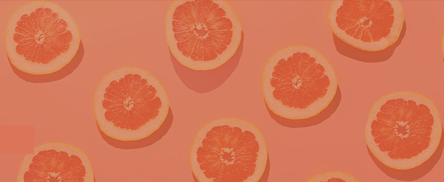 Overhead image of a fresh grapefruit, representing the Citrus scent family of &Better products. The image symbolizes the rejuvenating and invigorating aroma of essential oils, grapefruit, and mint, crafted to elevate your spirit and refresh your senses for an instant mood uplift
